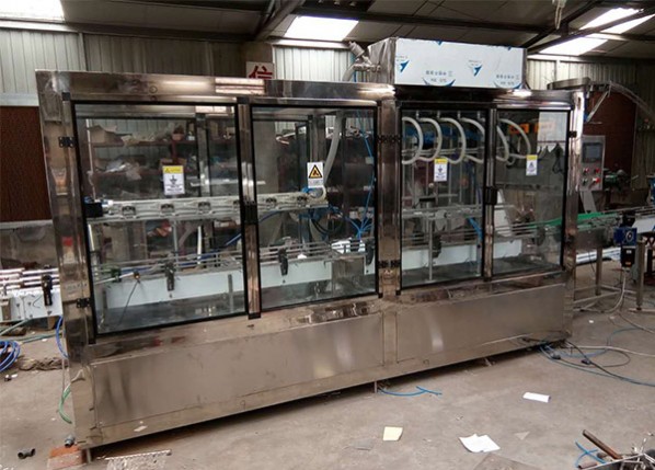 桶裝水直線(xiàn)反轉(zhuǎn)沖瓶灌裝雙聯(lián)機(jī)